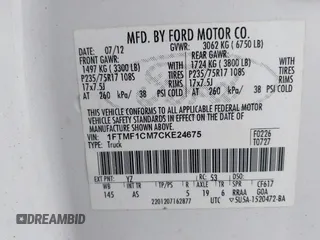 2012 Ford F-150 XL with VIN 1FTMF1CM7CKE24675, listed as a IAAI auction lot 41884476 with 127,455 mi miles. Bid and sale history available at carsss.com. Image 9.