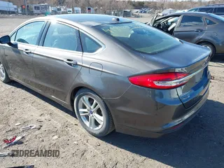 2018 Ford Fusion SE with VIN 3FA6P0HDXJR165459, listed as a IAAI auction lot 41810123 with 97,281 mi miles. Bid and sale history available at carsss.com. Image 3.