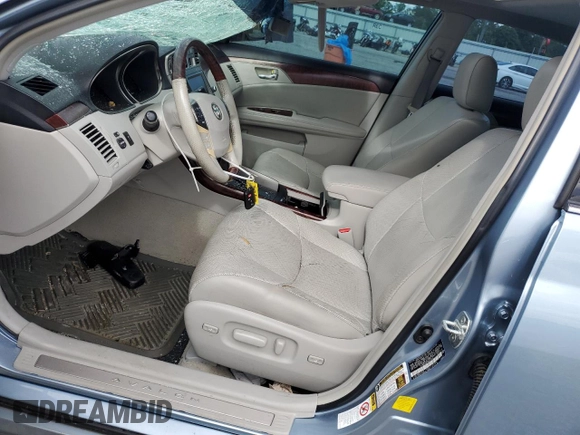 2011 Toyota Avalon with VIN 4T1BK3DB7BU434875, listed as a Copart auction lot 56509315 with 147,492 mi miles and Salvage title. Bid and sale history available at DreamBid. Image 7.