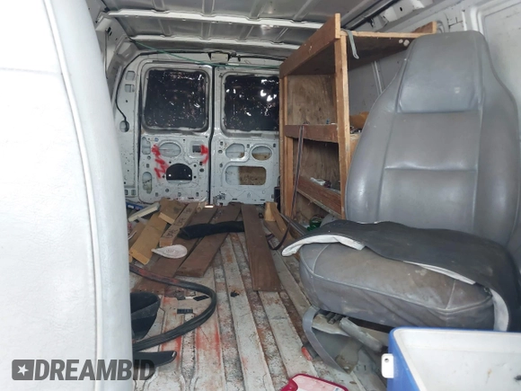 1998 Ford Econoline Cargo with VIN 1FTNS2421WHC08759, listed as a IAAI auction lot 42785005 with Not provided miles and . Bid and sale history available at DreamBid. Image 8.