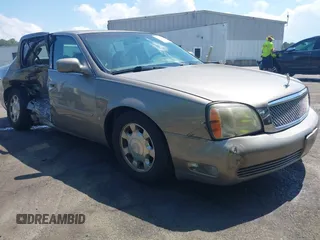 2002 Cadillac DeVille z VIN 1G6KD54Y62U110981, wystawiony jako IAAI lot #42310283 z przebiegiem 149 453 mil mil oraz . Historia ofert i sprzedaży dostępna na DreamBid. Obrazek 1.