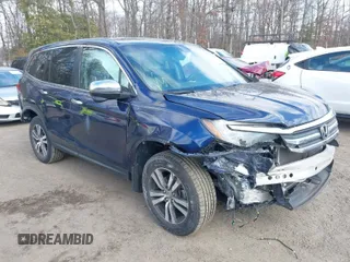2017 Honda Pilot EX-L with VIN 5FNYF6H59HB101250, listed as a IAAI auction lot 41628440 with 117,328 mi miles and . Bid and sale history available at DreamBid. Image 1.