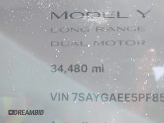 2023 Tesla Model Y Long Range with VIN 7SAYGAEE5PF855834, listed as a IAAI auction lot 41943491 with 34,480 mi miles. Bid and sale history available at carsss.com. Image 16.