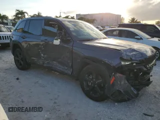 2024 Jeep Grand Cherokee Altitude X with VIN 1C4RJHAG2RC716215, listed as a Copart auction lot 42922815 with 14,653 mi miles and Salvage title. Bid and sale history available at DreamBid. Image 4.