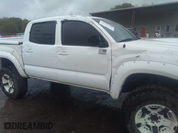 2011 Toyota Tacoma with VIN 5TFLU4ENXBX022207, listed as a IAAI auction lot 36494648 with 75,782 mi miles and . Bid and sale history available at DreamBid. Image 6.