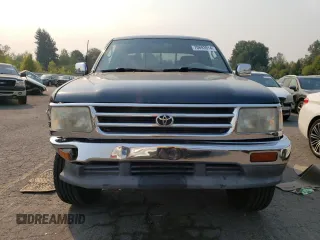 1996 Toyota T100 SR5 z VIN JT4UN24D3T0032313, wystawiony jako Copart lot #70693914 z przebiegiem 210 021 mil mil oraz Szkody całkowita. Historia ofert i sprzedaży dostępna na DreamBid. Obrazek 5.