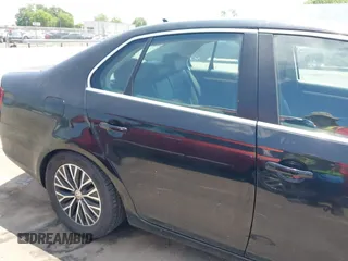 2009 Volkswagen Jetta SE with VIN 3VWRM71K79M166916, listed as a IAAI auction lot 42400659 with 166,061 mi miles and . Bid and sale history available at DreamBid. Image 12.