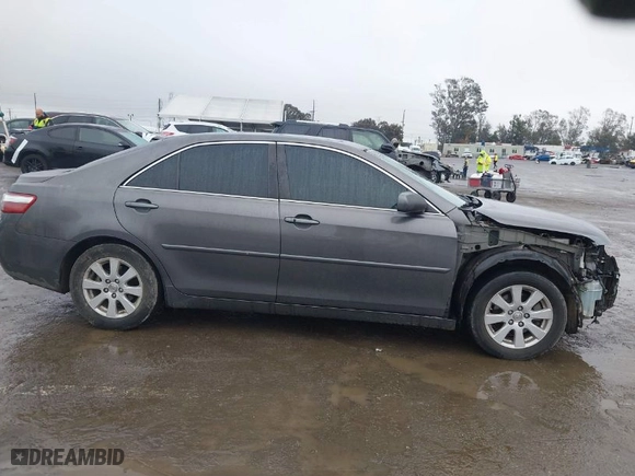 2009 Toyota Camry Hybrid with VIN JTNBB46K993050258, listed as a IAAI auction lot 41507184 with 269,407 mi miles. Bid and sale history available at carsss.com. Image 13.