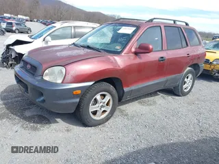 2003 Hyundai Santa Fe GLS with VIN KM8SC13E43U526945, listed as a IAAI auction lot 41847683 with 180,986 mi miles. Bid and sale history available at carsss.com. Image 2.