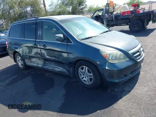 2005 Honda Odyssey EX z VIN 5FNRL38445B401096, wystawiony jako IAAI lot #42444495 z przebiegiem 142 214 mil mil oraz . Historia ofert i sprzedaży dostępna na DreamBid. Obrazek 1.