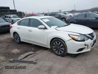 2016 Nissan Altima 2.5 S with VIN 1N4AL3AP0GC272815, listed as a IAAI auction lot 41547789 with 124,313 mi miles. Bid and sale history available at carsss.com. Image 1.