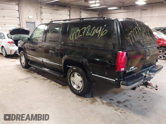 1999 GMC Suburban z VIN 3GKFK16R3XG529761, wystawiony jako IAAI lot #42272646 z przebiegiem 269 114 mil mil oraz . Historia ofert i sprzedaży dostępna na DreamBid. Obrazek 3.