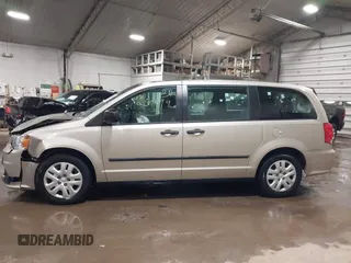 2015 Dodge Grand Caravan SE with VIN 2C4RDGBG2FR592899, listed as a IAAI auction lot 41309499 with 110,428 mi miles and . Bid and sale history available at DreamBid. Image 14.