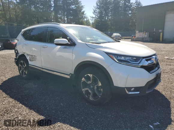 2018 Honda CR-V Touring with VIN 2HKRW2H9XJH619830, listed as a Copart auction lot 53694675 with 95,703 mi miles and Salvage title. Bid and sale history available at DreamBid. Image 4.