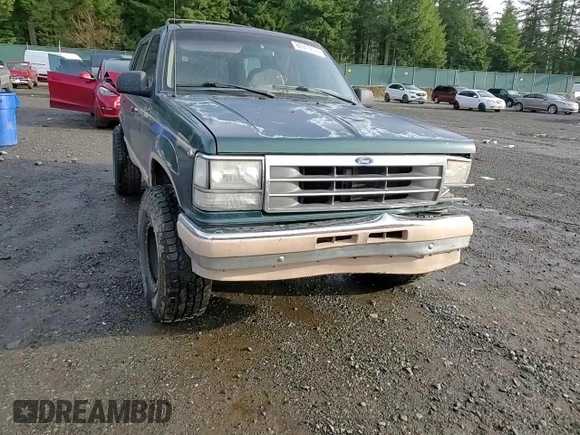 1992 Ford Explorer Eddie Bauer with VIN 1FMDU34X1NUB84827, listed as a Copart auction lot 86973574 with 73,452 mi miles and Salvage title. Bid and sale history available at DreamBid. Image 12.