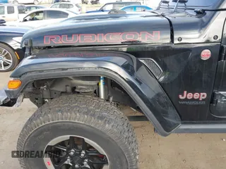 2020 Jeep Wrangler Unlimited Rubicon with VIN 1C4HJXFG1LW141335, listed as a IAAI auction lot 42724973 with 59,843 mi miles and . Bid and sale history available at DreamBid. Image 18.