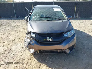 2017 Honda Fit LX with VIN JHMGK5H58HS022560, listed as a IAAI auction lot 40710663 with 86,228 mi miles and . Bid and sale history available at DreamBid. Image 12.