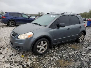 2009 Suzuki SX4 Touring AWD z VIN JS2YB417096202224, wystawiony jako Copart lot #54605945 z przebiegiem 111 029 mil mil oraz Nie do naprawy • Non repairable. Historia ofert i sprzedaży dostępna na DreamBid. Obrazek 1.