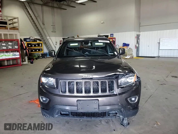 2016 Jeep Grand Cherokee Laredo with VIN 1C4RJFAG2GC317791, listed as a Copart auction lot 51296425 with 188,488 mi miles and Salvage title. Bid and sale history available at DreamBid. Image 11.