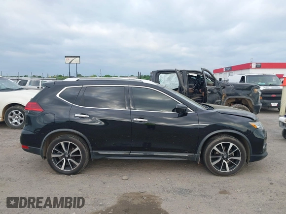 2017 Nissan Rogue SL with VIN JN8AT2MT2HW147638, listed as a IAAI auction lot 42062098 with 198,747 mi miles and . Bid and sale history available at DreamBid. Image 13.