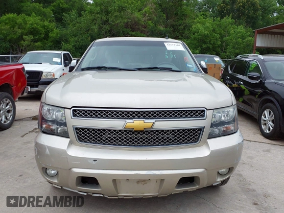 2013 Chevrolet Suburban LT with VIN 1GNSKJE74DR166223, listed as a IAAI auction lot 42172184 with 200,901 mi miles and . Bid and sale history available at DreamBid. Image 12.