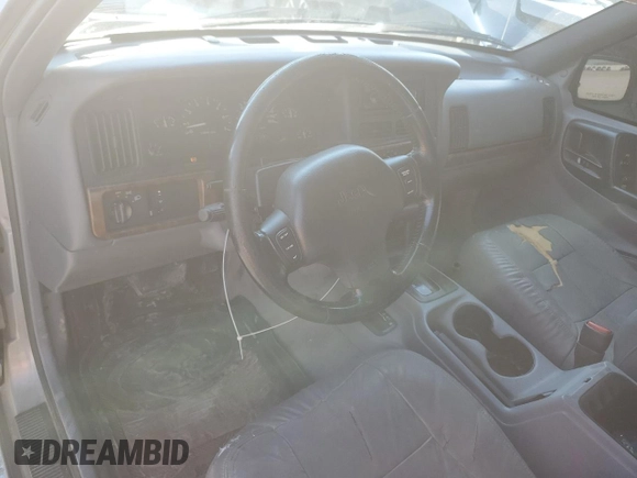 1998 Jeep Grand Cherokee Laredo with VIN 1J4GZ58S8WC301754, listed as a Copart auction lot 69698144 with 205,739 mi miles and Non Repairable. Bid and sale history available at carsss.com. Image 8.