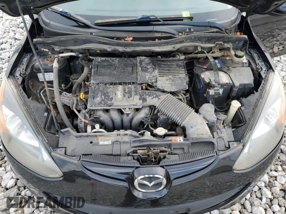 2011 Mazda 2 Touring z VIN JM1DE1HY2B0114734, wystawiony jako Copart lot #86430934 z przebiegiem 123 265 mil mil oraz Czysty tytuł • Clean title. Historia ofert i sprzedaży dostępna na DreamBid. Obrazek 11.