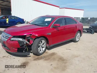 2011 Ford Taurus SEL z VIN 1FAHP2EW7BG123740, wystawiony jako IAAI lot #41890761 z przebiegiem 132 310 mil mil oraz . Historia ofert i sprzedaży dostępna na DreamBid. Obrazek 18.