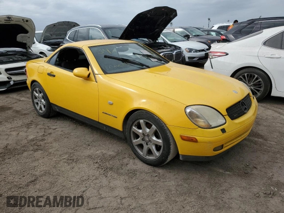 1999 Mercedes-Benz SLK-Class with VIN WDBKK47F3XF085992, listed as a Copart auction lot 76931354 with 0 mi miles and Salvage Title. Bid and sale history available at carsss.com. Image 4.