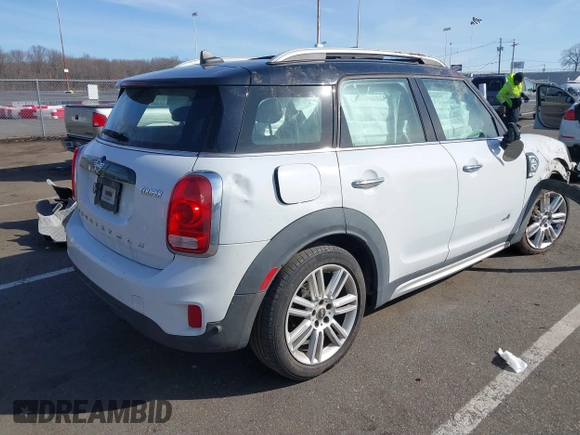 2019 MINI Countryman Cooper with VIN WMZYV5C55K3E05106, listed as a IAAI auction lot 41514627 with 69,399 mi miles. Bid and sale history available at carsss.com. Image 4.