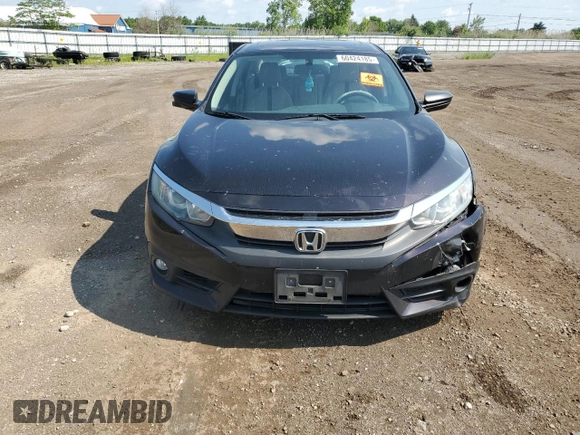 2016 Honda Civic EX-L z VIN 19XFC1F70GE002599, wystawiony jako Copart lot #60424185 z przebiegiem 113 707 mil mil oraz Szkoda całkowita • Salvage title. Historia ofert i sprzedaży dostępna na DreamBid. Obrazek 5.