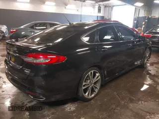 2017 Ford Fusion Titanium with VIN 3FA6P0D93HR197617, listed as a IAAI auction lot 41673022 with 65,041 mi miles and . Bid and sale history available at DreamBid. Image 4.