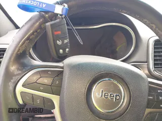 2020 Jeep Grand Cherokee Altitude with VIN 1C4RJFAG2LC241483, listed as a IAAI auction lot 42466089 with 68,638 mi miles and . Bid and sale history available at DreamBid. Image 11.