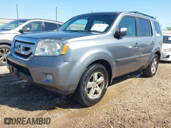 2009 Honda Pilot EX-L with VIN 5FNYF48539B035820, listed as a IAAI auction lot 41942149 with 242,463 mi miles. Bid and sale history available at carsss.com. Image 2.