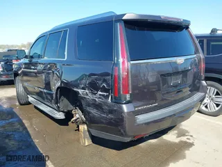 2015 Cadillac Escalade Luxury with VIN 1GYS3MKJ2FR518865, listed as a IAAI auction lot 41890235 with 156,849 mi miles. Bid and sale history available at carsss.com. Image 3.