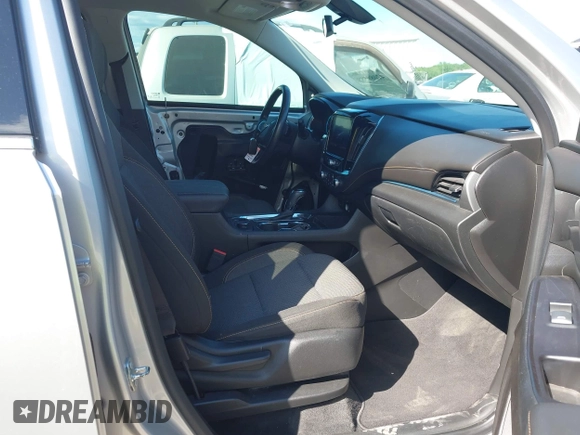 2020 Chevrolet Traverse LT Cloth z VIN 1GNERGKW3LJ177069, wystawiony jako IAAI lot #42080588 z przebiegiem 91 630 mil mil oraz . Historia ofert i sprzedaży dostępna na DreamBid. Obrazek 5.