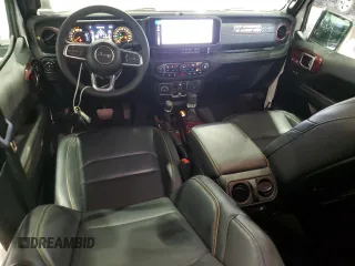 2024 Jeep Wrangler Sahara with VIN 1C4PJXEG8RW354580, listed as a Copart auction lot 64086715 with 11,721 mi miles and Salvage title. Bid and sale history available at DreamBid. Image 8.