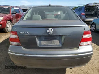 2004 Volkswagen Jetta GL with VIN 3VWRK69M14M017562, listed as a Copart auction lot 45798285 with 147,648 mi miles and Clean title. Bid and sale history available at DreamBid. Image 6.