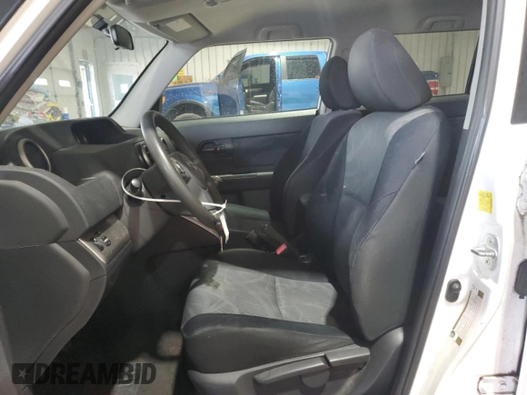 2011 Scion xB z VIN JTLZE4FE6B1125993, wystawiony jako Copart lot #53336335 z przebiegiem 229 378 mil mil oraz Szkoda całkowita • Salvage title. Historia ofert i sprzedaży dostępna na DreamBid. Obrazek 7.