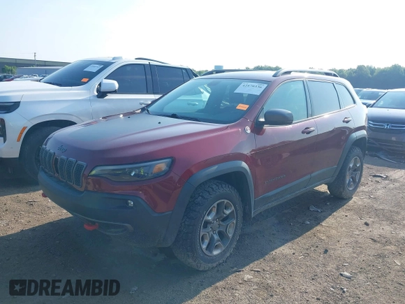 2019 Jeep Cherokee Trailhawk with VIN 1C4PJMBX5KD421043, listed as a IAAI auction lot 42570336 with 114,463 mi miles and . Bid and sale history available at DreamBid. Image 2.
