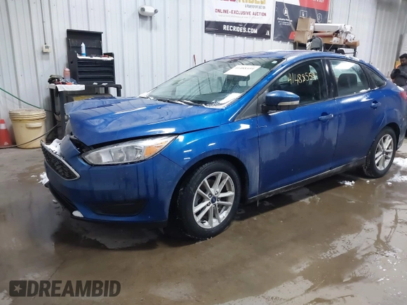 2018 Ford Focus SE z VIN 1FADP3F26JL312725, wystawiony jako IAAI lot #41488559 z przebiegiem 30 686 mil mil oraz . Historia ofert i sprzedaży dostępna na DreamBid. Obrazek 18.