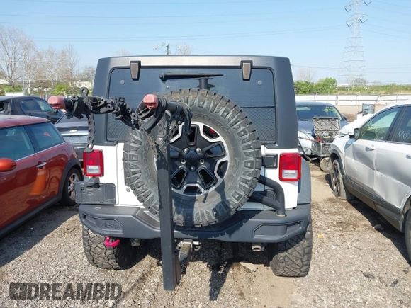 2015 Jeep Wrangler Unlimited Rubicon with VIN 1C4BJWFG1FL602412, listed as a IAAI auction lot 42065619 with 109,070 mi miles. Bid and sale history available at carsss.com. Image 16.