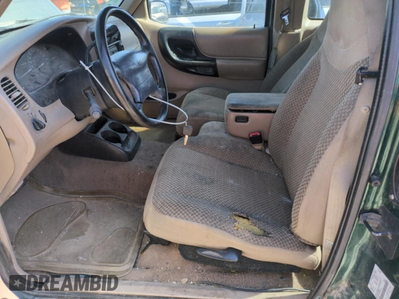 1999 Ford Ranger XL with VIN 1FTZR15V6XPB66872, listed as a Copart auction lot 63710445 with 178,447 mi miles and Clean title. Bid and sale history available at DreamBid. Image 7.