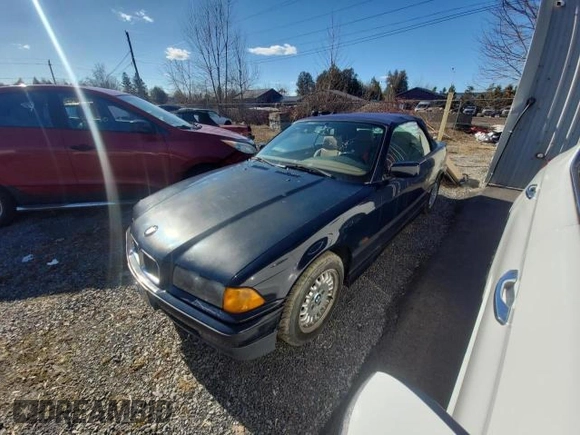 1995 BMW 3 Series 318iC with VIN WBABK6328SED18313, listed as a Copart auction lot 51153305 with 285,000 mi miles and Salvage Title. Bid and sale history available at carsss.com. Image 2.