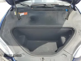 2016 Tesla Model S 90D z VIN 5YJSA1E20GF160834, wystawiony jako Copart lot #61898505 z przebiegiem 131 153 mil mil oraz Szkoda całkowita • Salvage title. Historia ofert i sprzedaży dostępna na DreamBid. Obrazek 11.
