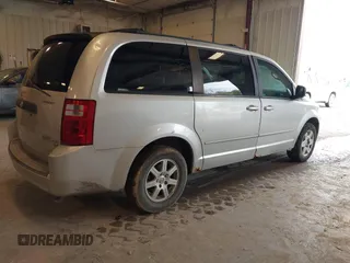 2010 Dodge Grand Caravan SE with VIN 2D4RN4DE8AR173359, listed as a IAAI auction lot 42170689 with 246,553 mi miles and . Bid and sale history available at DreamBid. Image 4.