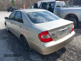 2003 Toyota Camry LE with VIN 4T1BE32K13U787169, listed as a IAAI auction lot 41510710 with 193,197 mi miles and . Bid and sale history available at DreamBid. Image 6.