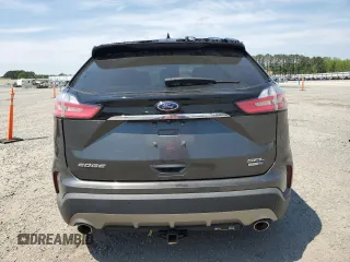 2020 Ford Edge SEL с VIN 2FMPK4J93LBB60742, выставлен на аукционе Copart как лот 52604255 с пробегом 37 659 миль миль и Списание • Salvage title. История ставок и продаж доступна на DreamBid. Изображение 6.