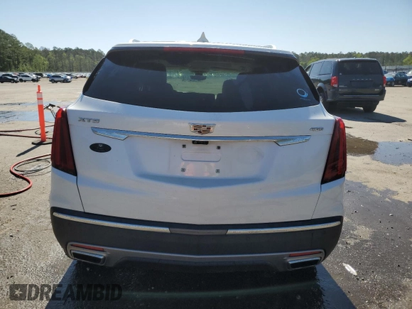 2021 Cadillac XT5 FWD Premium Luxury z VIN 1GYKNCRS2MZ209820, wystawiony jako Copart lot #51332565 z przebiegiem 52 916 mil mil oraz Szkoda całkowita • Salvage title. Historia ofert i sprzedaży dostępna na DreamBid. Obrazek 6.