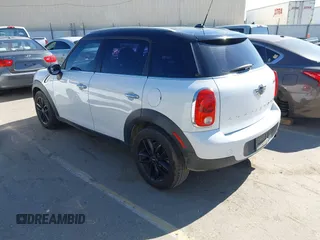 2015 MINI Countryman with VIN WMWZB3C51FWR45357, listed as a IAAI auction lot 41871831 with 201,358 mi miles and . Bid and sale history available at DreamBid. Image 3.